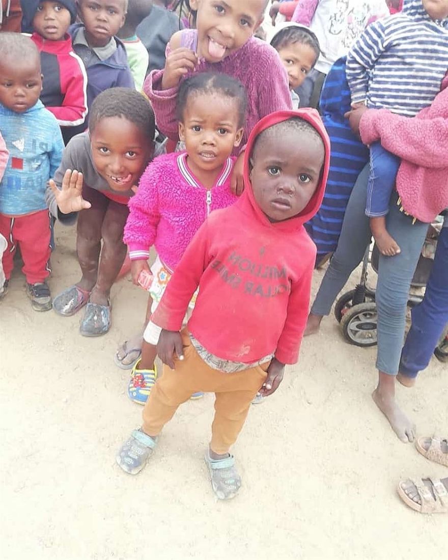 Some of the children in line waiting for their lunch